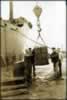 Macquire, Hale, Bernardi, + Spencer. Loading ballast from a barge. Frisco - Jan., 1946 (43,117 bytes)